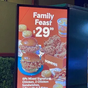 a family feast sign