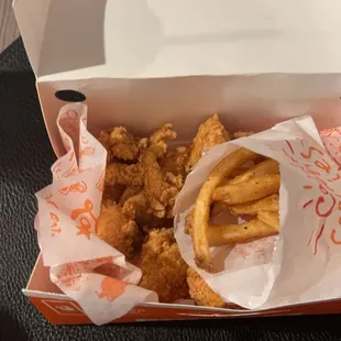 pic of 12 nugs and the 5 fries they gave me