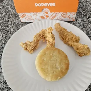 Gently cooked fresh chicken tenders with a biscuit.
