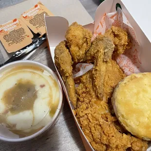 2 fresh wings 1 fresh chicken breast fresh biscuit and fresh  Mashed Potatoes with Cajun Gravy