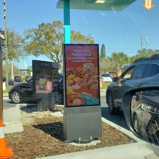 a view of the outside of a fast food restaurant