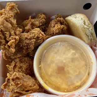 Ghost pepper wings and a biscuit