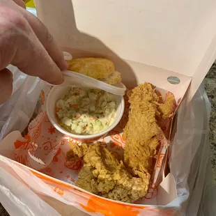 Coleslaw placed in box with hot food. Why? Especially in a drive through pick up where it may not be immediately eaten.