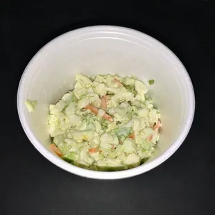 $4 for a half filled cup of slaw.