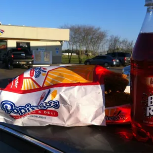 a teddy bear and a bag of fries