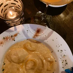 Pumpkin ravioli in a walnut nutmeg sauce. Soooo good!