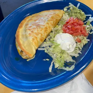 Great new little local Mexican place. This is a Chicken Ranchero Quesadilla.