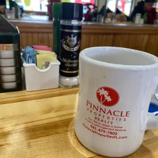 a cup of coffee on a table