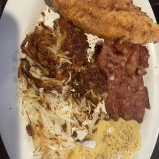 Corn beef Hash with Poached eggs and Hashbrowns.  Add hollandaise.  Add Catfish.