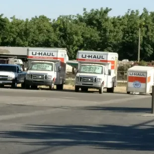 trucks parked on the side of the road