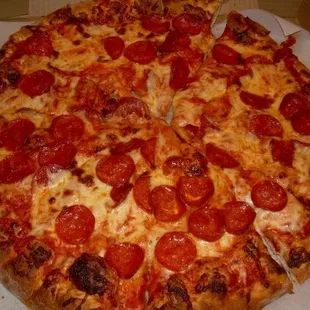 a pepperoni pizza in a box