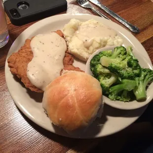 Chicken fried chicken, mashed potatos, roll, choice of sides (broccoli).