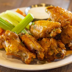Wings baby! We have Happy Hour running from 11AM - close everyday