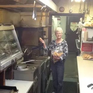 a woman in a kitchen