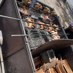 a grill with a bunch of food on it