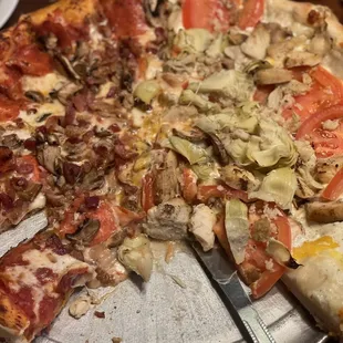1/2 Garlic Chicken 1/2 pepperoni, mushrooms, bacon