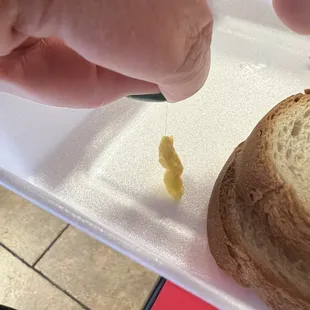 Hair cooked into egg.