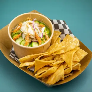 a bowl of food with chips