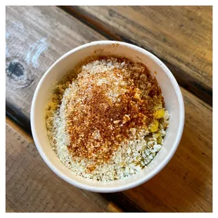 Street Corn Cup: chard corn / crema / cotija cheese / chili shrimp dust