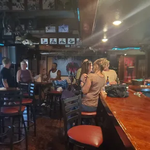 people sitting at the bar