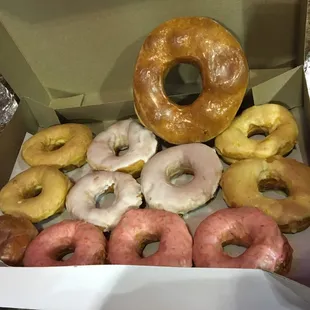 One giant glazed and a mixed dozen