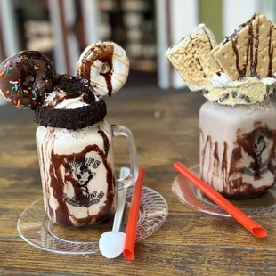 two chocolate milkshakes with marshmallows