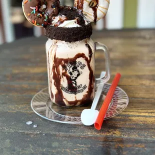 a chocolate milkshake with sprinkles