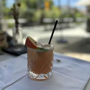 A version of a whiskey smash with peach and passion fruit.