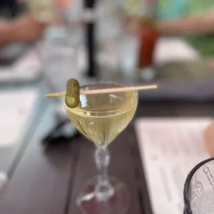 "Surrender Dorothy": dill-infused vodka, Dolin blanc, celery bitters, cornichon