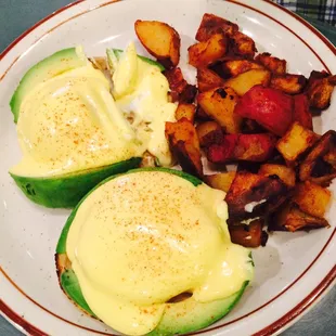 Eggs Benedict with avocado.
