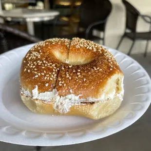 Toasted sesame bagel w/ plain cream cheese ($4.19).
