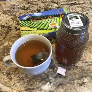 a cup of tea and a jar of tea