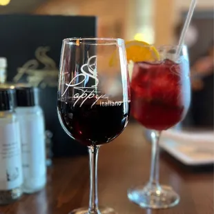 a glass of wine and a drink