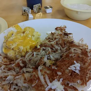 Cheese eggs shredded hash browns and grits