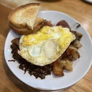 Eggs, brisket, potatoes, toast