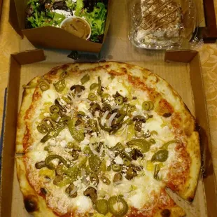 House salad, tiramisu and medium veggie lovers pizza