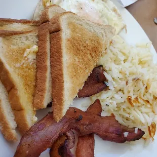 Crispy Bacon, 2 eggs over medium, wheat toast, and hasbrowns