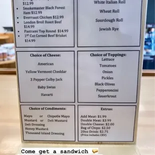 Pops Butcher &amp; Deli meat counter and sandwiches. Pic of the owners Hector &amp; Candice Garcia.