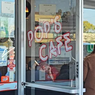 a woman entering the door