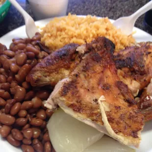 1/2 a chicken, rice and beans.