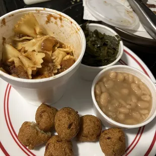 Southern food doesn&apos;t get any better than this!  Pop&apos;s Bow tie Spaghetti ,Turnip Greens ,Northern Beans &amp; Hushpuppies.YUM