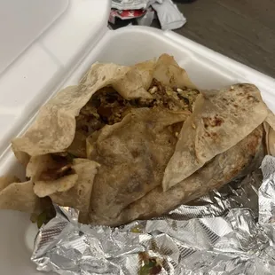 Un wrapped and oily burrito