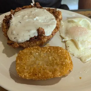 Chicken fried steak and hash browns
