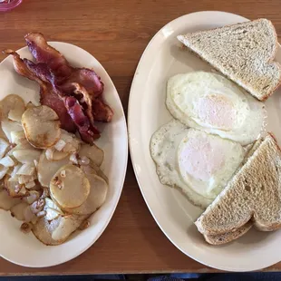 Platter #1 - Eggs, Choice of Potatoes, Meat, Toast or Biscuit and includes Coffee - $6.75
