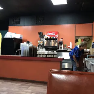 a person standing at the counter