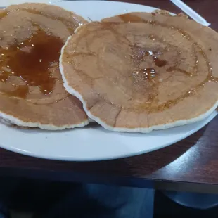Half order pancakes drizzled in