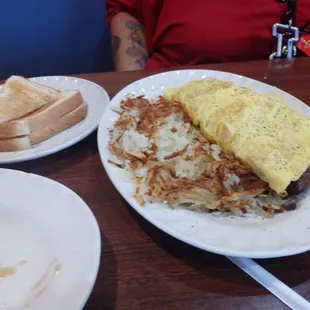 Hasbrowns and Porky Omelette side of toast