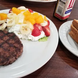 Ground round with cottage cheese and dry wheat toast.