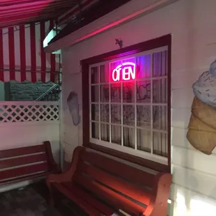 Seating area - outdoors, under an awning.  Very pleasant on a summer evening.
