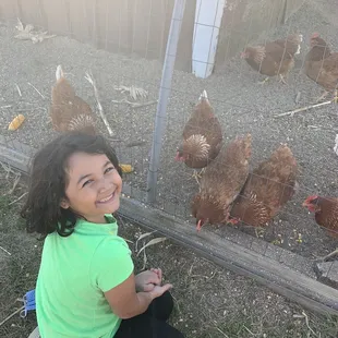 My daughter at the chicken coop.